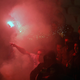 Illustration for article titled Smoke, Flares, Riot Police In Belgrade Derby Make For Haunting Photos